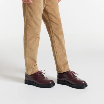 Boy derbies in glazed leather